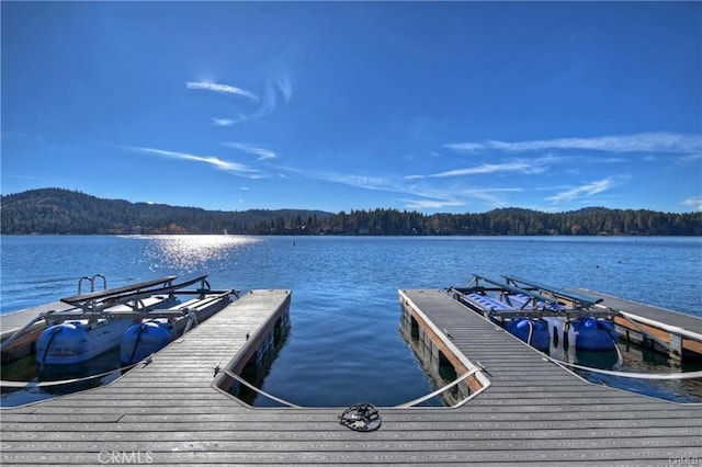 27417 Matterhorn Dr, Lake Arrowhead, CA 92352 - dock area featuring a water view and a forest view