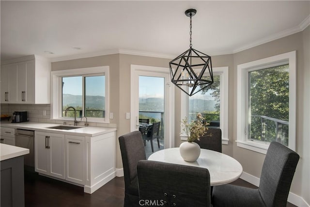 27417 Matterhorn Dr, Lake Arrowhead, CA 92352 - dining room featuring a notable chandelier, baseboards, plenty of natural light, and dark wood finished floors