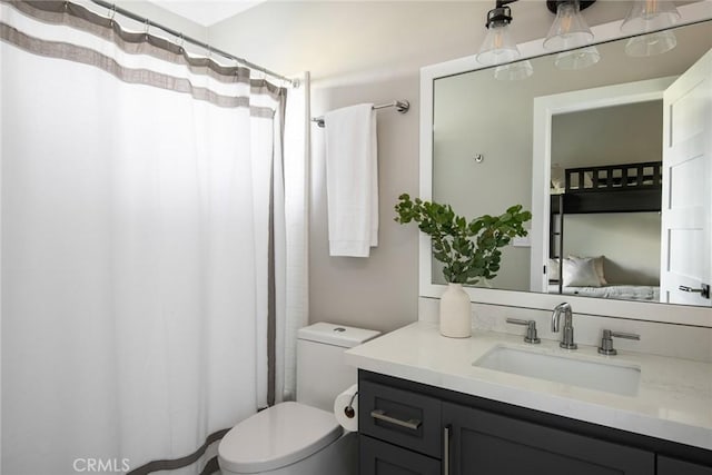 27417 Matterhorn Dr, Lake Arrowhead, CA 92352 - ensuite bathroom featuring vanity, toilet, a shower with curtain, and ensuite bathroom