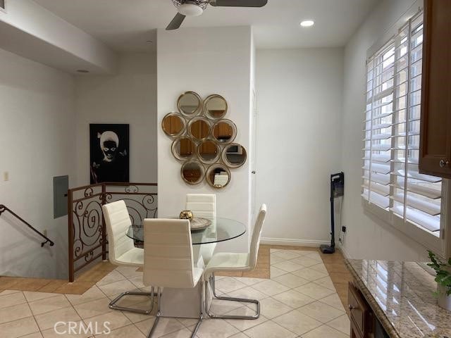 dining area with light tile patterned floors, a wealth of natural light, and recessed lighting
