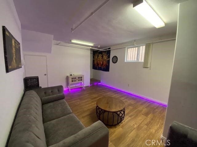 living room with wood finished floors