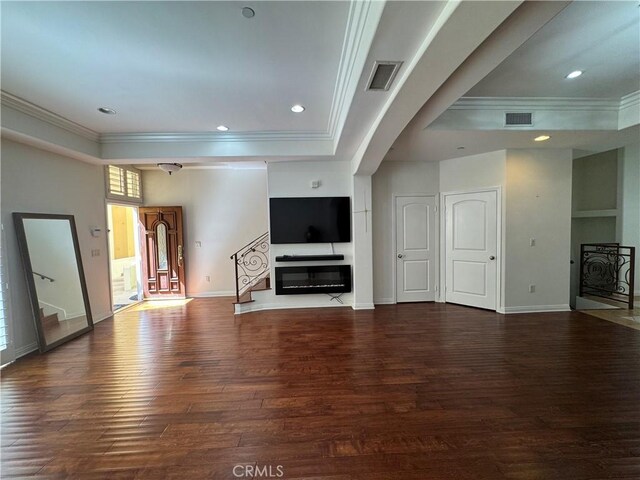 14535 Margate St Unit 12, Sherman Oaks, CA 91411 - unfurnished living room with a glass covered fireplace, wood finished floors, crown molding, a raised ceiling, and baseboards