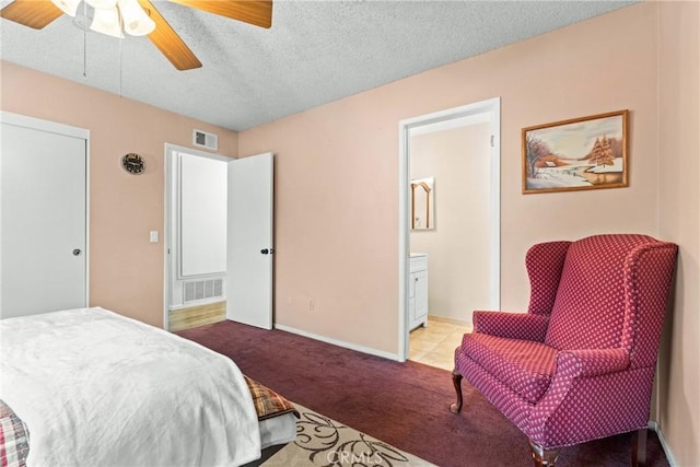 11348 Ramona Ave, Pomona, CA 91766 - bedroom with a textured ceiling, ensuite bath, ceiling fan, visible vents, and light carpet