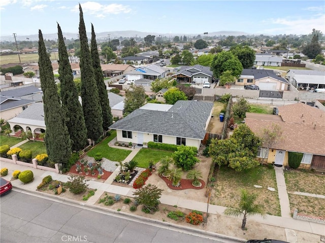 11348 Ramona Ave, Pomona, CA 91766 - drone / aerial view with a residential view