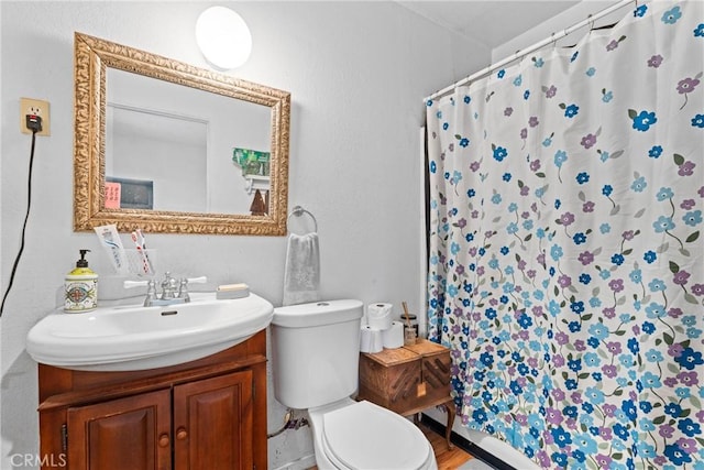 11348 Ramona Ave, Pomona, CA 91766 - full bathroom with toilet, a shower with curtain, and vanity