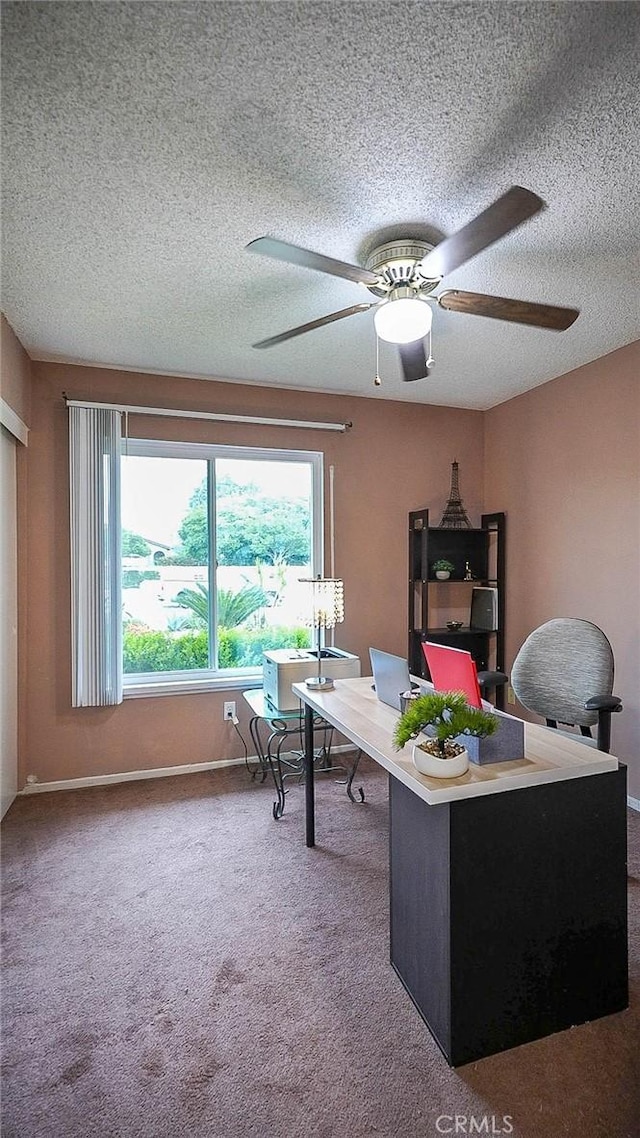 11348 Ramona Ave, Pomona, CA 91766 - carpeted office space with a textured ceiling, baseboards, and a ceiling fan