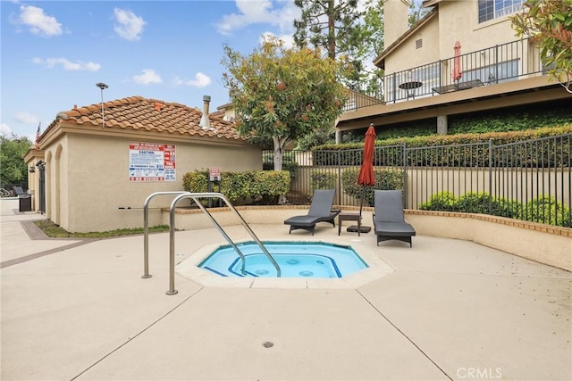 1092 Amberton Ln, Newbury Park, CA 91320 - view of pool with a community hot tub, fence, and a patio area