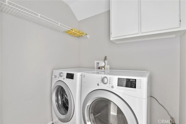 1092 Amberton Ln, Newbury Park, CA 91320 - laundry room with cabinet space and washing machine and clothes dryer