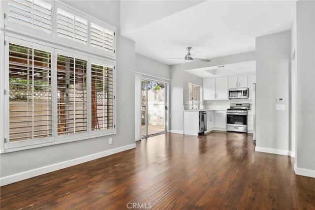 1092 Amberton Ln, Newbury Park, CA 91320 - unfurnished living room with a ceiling fan, dark wood-style floors, and baseboards