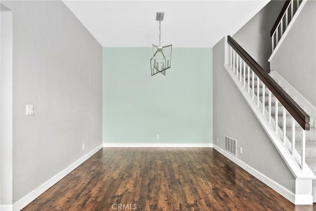 1092 Amberton Ln, Newbury Park, CA 91320 - unfurnished dining area featuring a chandelier, stairway, baseboards, and wood finished floors