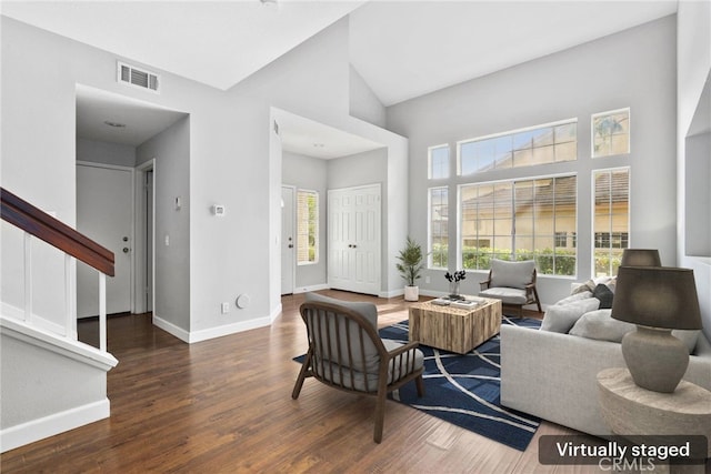 1092 Amberton Ln, Newbury Park, CA 91320 - living room with wood finished floors, stairs, baseboards, and a high ceiling