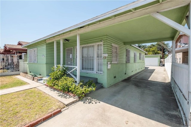 1257 E 76th Pl, Los Angeles, CA 90001 - view of property exterior featuring an outbuilding