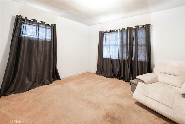 1257 E 76th Pl, Los Angeles, CA 90001 - sitting room featuring carpet floors and baseboards