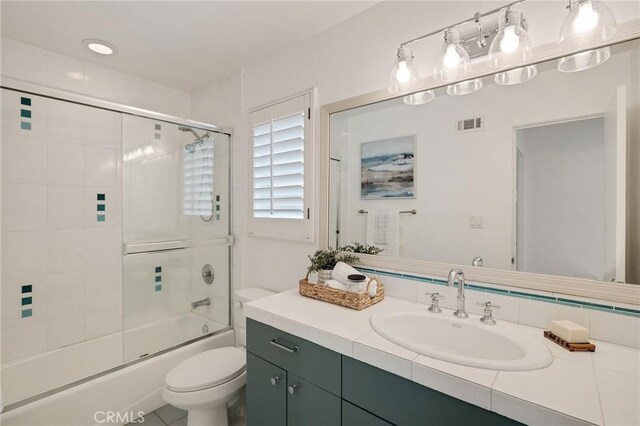 1429 Manhattan Ave, Hermosa Beach, CA 90254 - full bath with toilet, shower / bath combination with glass door, and vanity