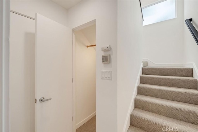 1429 Manhattan Ave, Hermosa Beach, CA 90254 - stairway featuring baseboards and carpet floors