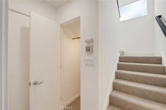 1429 Manhattan Ave, Hermosa Beach, CA 90254 - stairway with baseboards and carpet