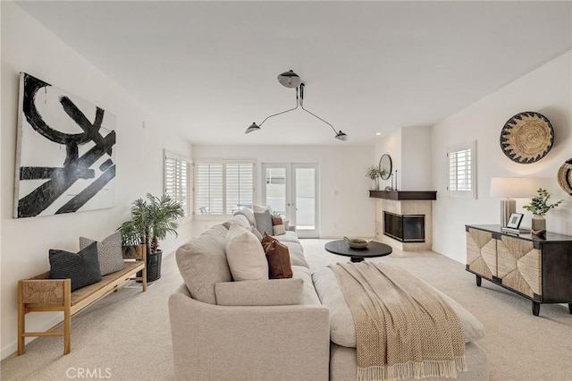 1429 Manhattan Ave, Hermosa Beach, CA 90254 - living room featuring carpet flooring, healthy amount of natural light, and a glass covered fireplace
