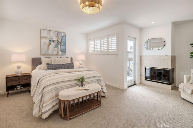 1429 Manhattan Ave, Hermosa Beach, CA 90254 - bedroom with a fireplace, light carpet, and baseboards
