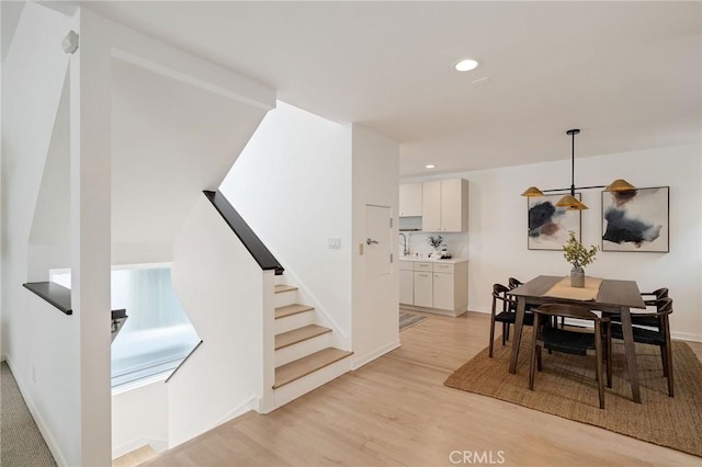 1429 Manhattan Ave, Hermosa Beach, CA 90254 - dining area featuring stairs, baseboards, light wood-type flooring, and recessed lighting