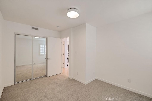 1429 Manhattan Ave, Hermosa Beach, CA 90254 - unfurnished bedroom featuring carpet flooring and a closet