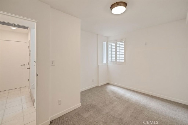 1429 Manhattan Ave, Hermosa Beach, CA 90254 - empty room featuring carpet, visible vents, and baseboards