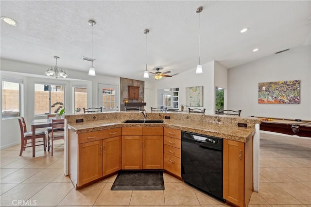51565 Avenida Carranza Ln, Quinta, CA 92253 - kitchen featuring black dishwasher, a sink, tile countertops, a ceiling fan, and pendant lighting