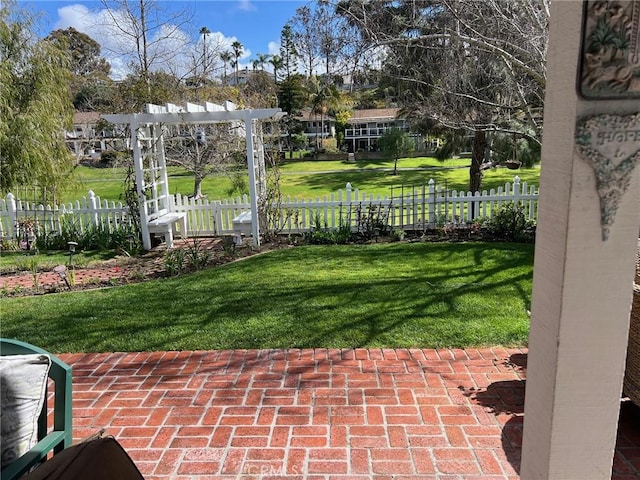 view of yard featuring a patio area and fence