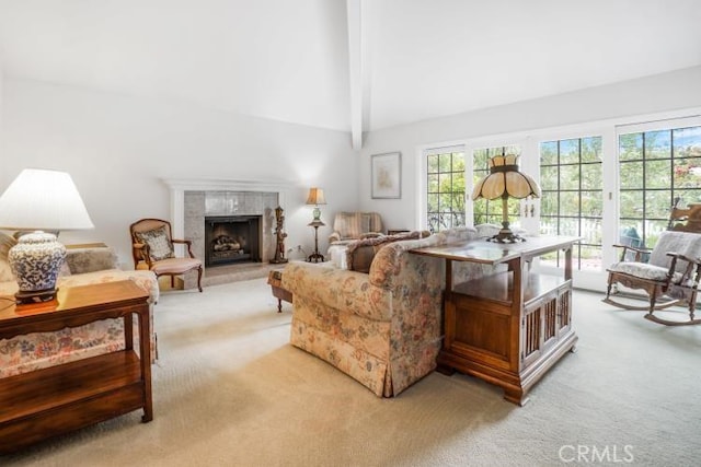 32182 Links Pointe, Laguna Niguel, CA 92677 - living area featuring light colored carpet, beamed ceiling, a fireplace, and high vaulted ceiling