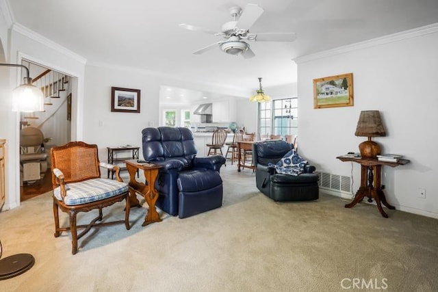 32182 Links Pointe, Laguna Niguel, CA 92677 - living room with ornamental molding, stairway, a ceiling fan, and light colored carpet