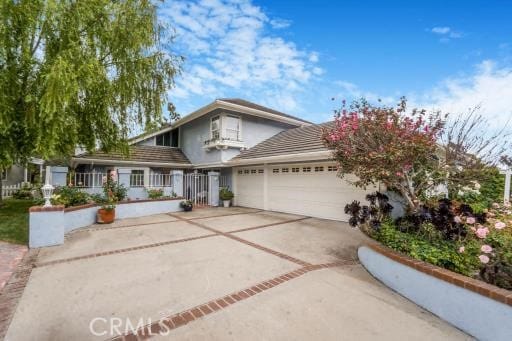 32182 Links Pointe, Laguna Niguel, CA 92677 - traditional home with concrete driveway and an attached garage