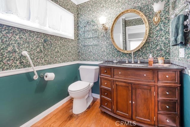 32182 Links Pointe, Laguna Niguel, CA 92677 - bathroom with wallpapered walls, wood finished floors, vanity, toilet, and ornamental molding