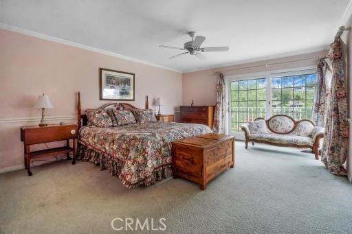 32182 Links Pointe, Laguna Niguel, CA 92677 - bedroom featuring carpet floors, crown molding, a ceiling fan, and baseboards