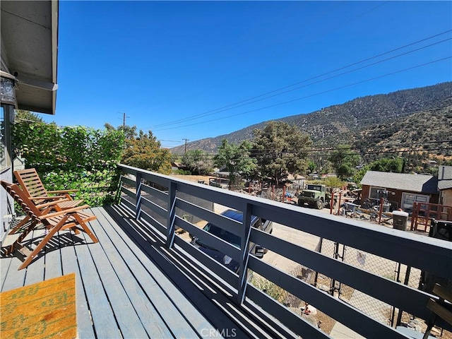 balcony featuring a mountain view
