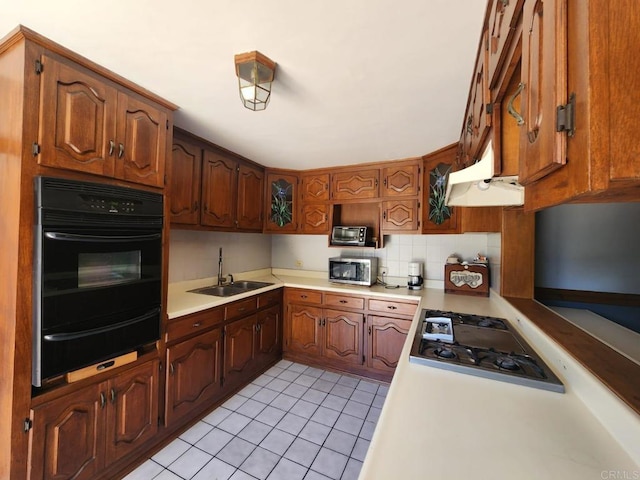112 Barco, Ensenada Bc Mexico, CA 22870 - kitchen featuring a sink, black oven, stainless steel microwave, a warming drawer, and gas cooktop