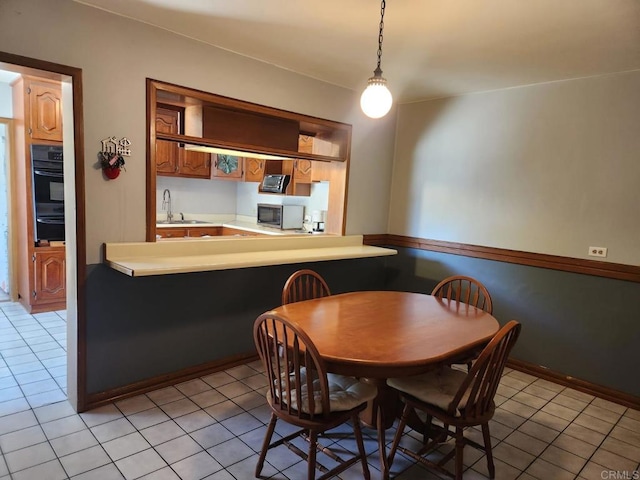 112 Barco, Ensenada Bc Mexico, CA 22870 - dining space featuring light tile patterned floors
