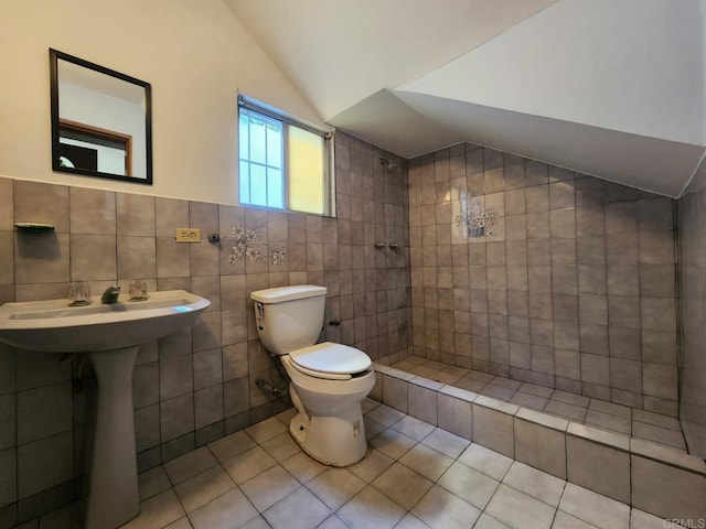 112 Barco, Ensenada Bc Mexico, CA 22870 - bathroom with toilet, lofted ceiling, tile walls, tile patterned floors, and tiled shower