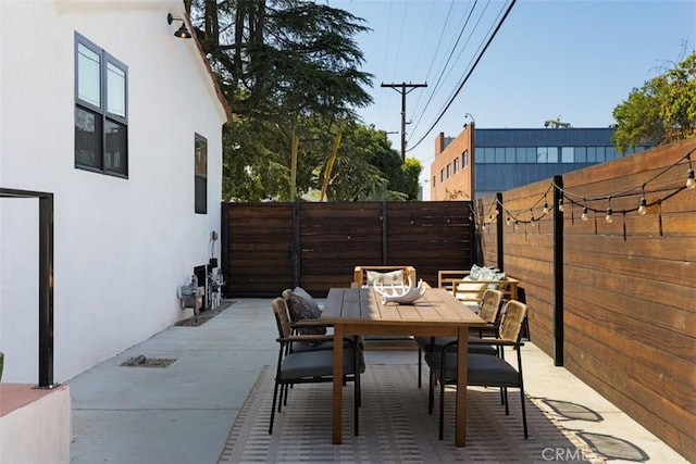 312 W Lutge Ave, Burbank, CA 91506 - view of patio featuring outdoor dining area and a fenced backyard
