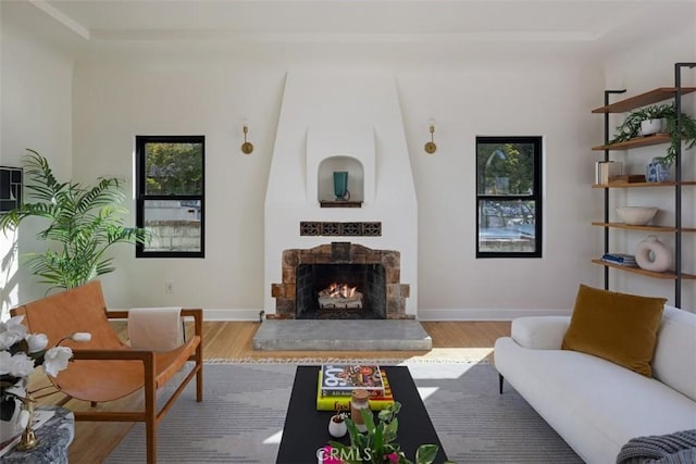 312 W Lutge Ave, Burbank, CA 91506 - living room with a lit fireplace, baseboards, and wood finished floors