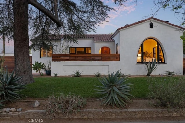 312 W Lutge Ave, Burbank, CA 91506 - mediterranean / spanish-style home with a tiled roof, stucco siding, and a front yard