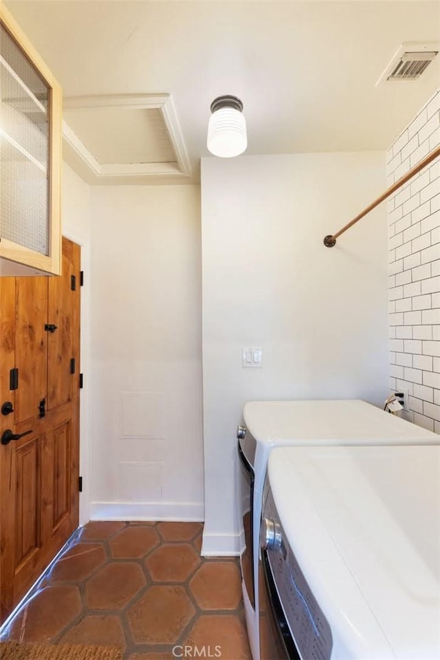 312 W Lutge Ave, Burbank, CA 91506 - washroom featuring baseboards, visible vents, tile patterned floors, washing machine and clothes dryer, and laundry area