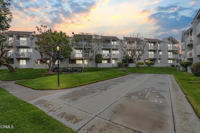 229 S Ventura Rd Unit 105, Port Hueneme, CA 93041 - view of community featuring a residential view, a yard, and shuffleboard
