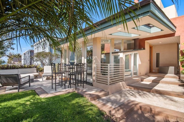 1407 Ocean, Del Mar, CA 92014 - rear view of house with an outdoor hangout area, a patio, and stucco siding