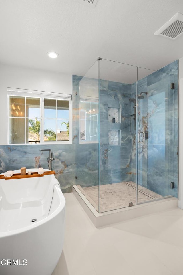 1323 Bayside Cir, Oxnard, CA 93035 - bathroom with a soaking tub, a marble finish shower, recessed lighting, and a sink