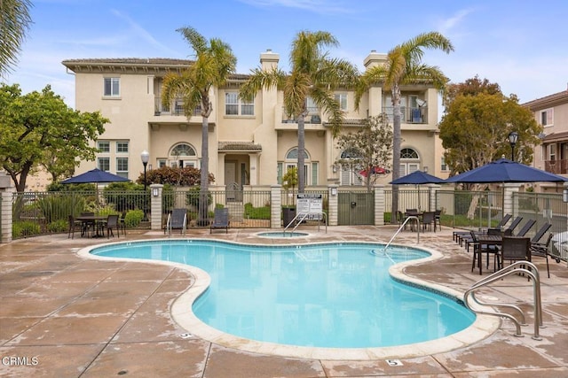 1323 Bayside Cir, Oxnard, CA 93035 - community pool featuring a patio area and a hot tub