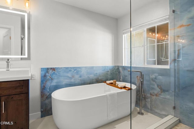 1323 Bayside Cir, Oxnard, CA 93035 - bathroom with vanity, a shower stall, and a freestanding tub