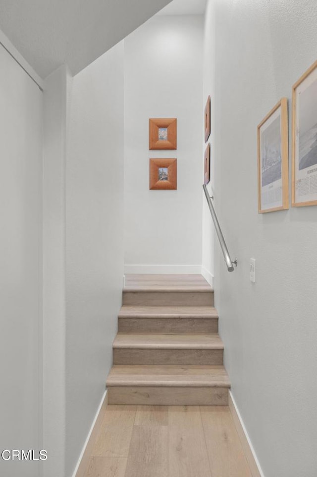 1323 Bayside Cir, Oxnard, CA 93035 - stairway featuring baseboards and wood finished floors