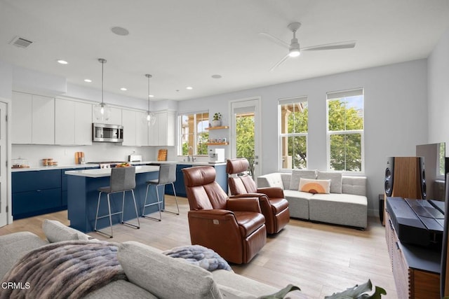 1323 Bayside Cir, Oxnard, CA 93035 - living area featuring plenty of natural light, ceiling fan, recessed lighting, and light wood-type flooring