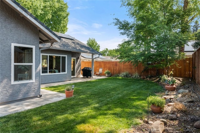 view of yard featuring a fenced backyard and a patio