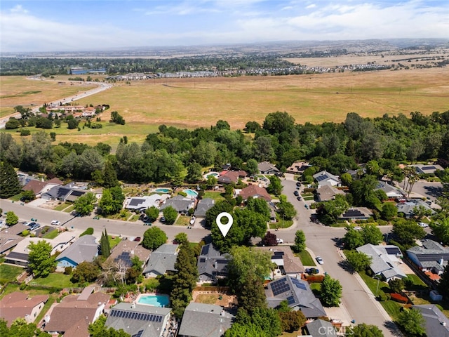aerial view featuring a rural view and a residential view