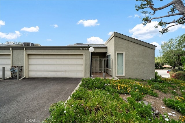 15796 Midwood Dr Unit 6, Granada Hills, CA 91344 - view of front facade with stucco siding and driveway